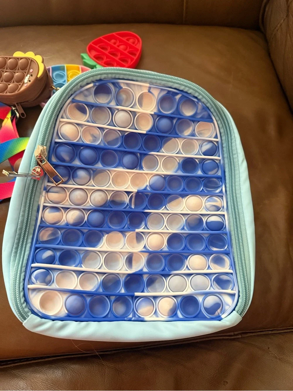Light Blue Pop-It Sensory Backpack with Blue-White Bubble Panel